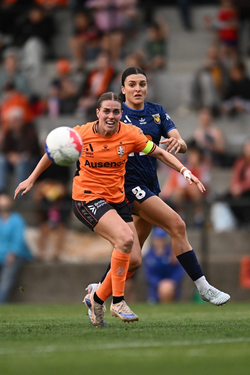 Natalie Tathem of Brisbane competes against Talia Kapetanellis of Central Coast at Gioca Stadium.
