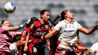 Sofia Sakalis of the Wanderers heads the ball into her own net at CommBank Stadium.